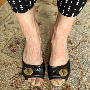 COACH Black and Gold Leather Slides